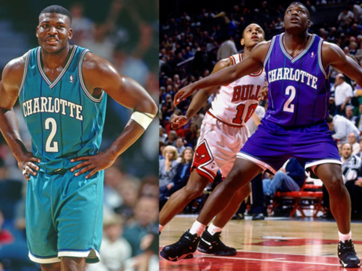 Hornets using teal-purple fade inside arc on throwback court