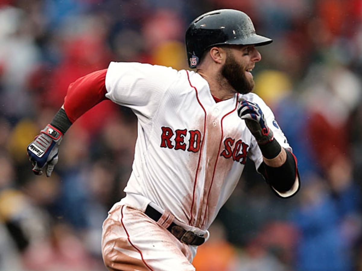 Former Boston Red Sox's Dustin Pedroia, right, walks off the field