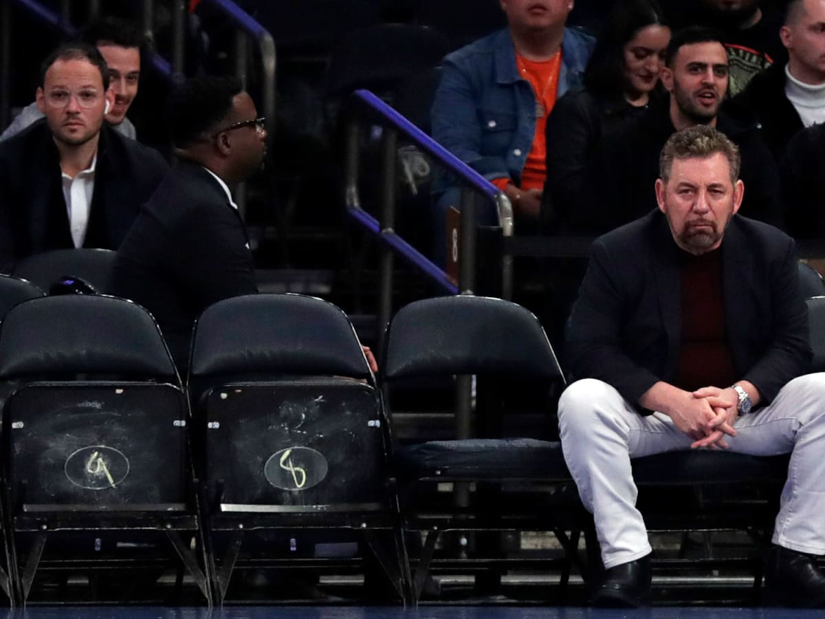 Knicks' security removes fan from seat for 'Fire Dolan' chant - Sports  Illustrated