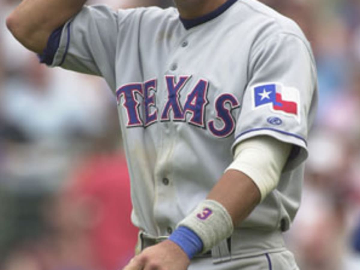 New York Yankees catcher Jorge Posada just misses Alex Gonzalez of