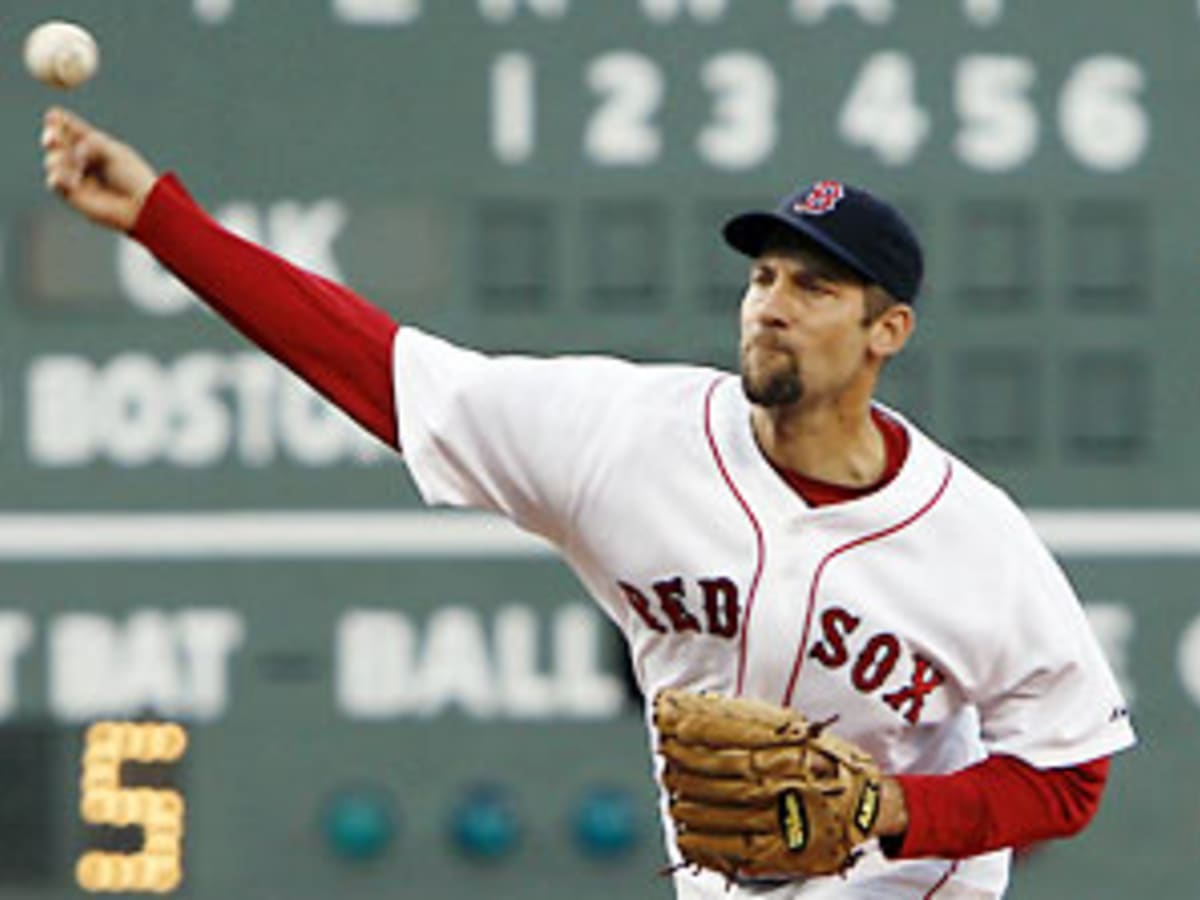 Pitcher John Smoltz of the St. Louis Cardinals delivers a pitch