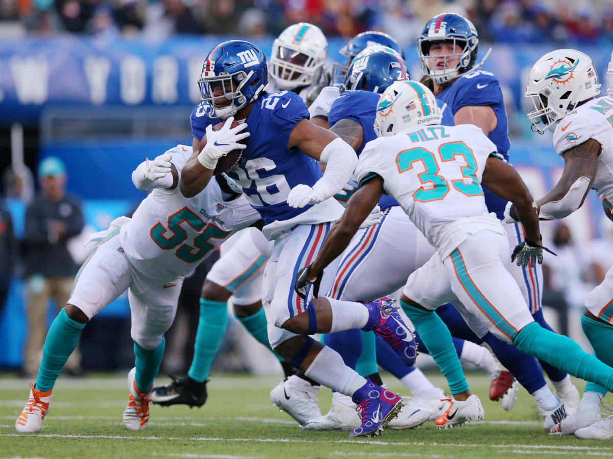 New York Giants' Saquon Barkley runs on the field before an NFL football  game against the Washington Commanders, Sunday, Dec. 4, 2022, in East  Rutherford, N.J. (AP Photo/John Minchillo Stock Photo - Alamy