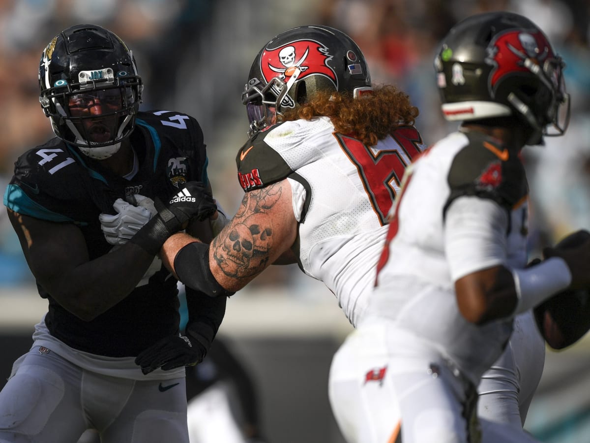 Jacksonville Jaguars defensive end Calais Campbell (93) and defensive end Josh  Allen (41) rush the line of scrimmage during the first half of an NFL  football game against the Tennessee Titans Thursday