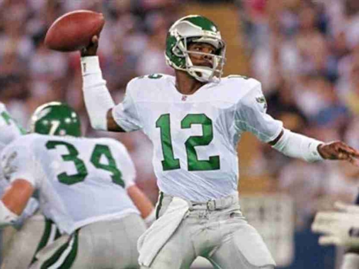 Philadelphia Eagles quarterback Randall Cunningham dives from the 1-yard  line to score and give Eagles 33-27 overtime victory over the Los Angeles  Raiders at the Coliseum in Los Angeles on Nov. 30, 1986. Raiders No. 75 is  Howie Long. (AP Photo/Bob