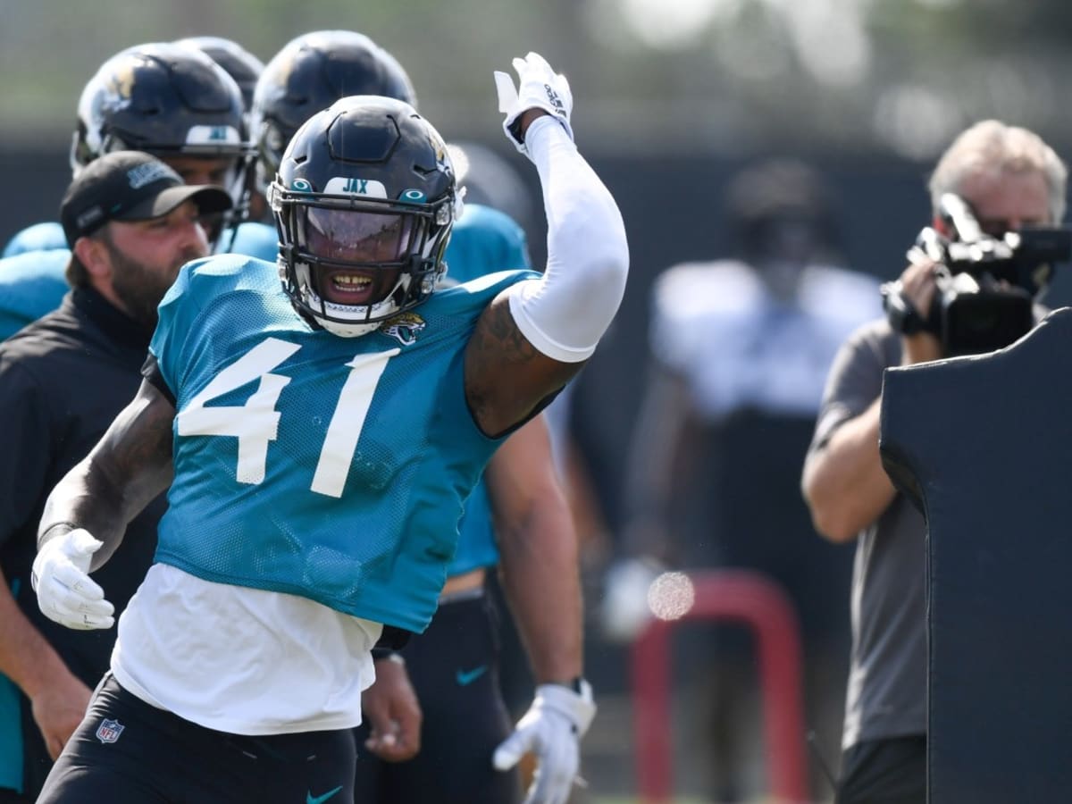 Jacksonville Jaguars K'Lavon Chaisson (45) performs a drill during