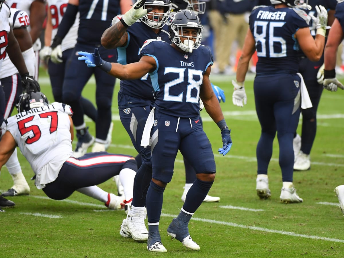 Tennessee Titans running back Jeremy McNichols (28) rushes against