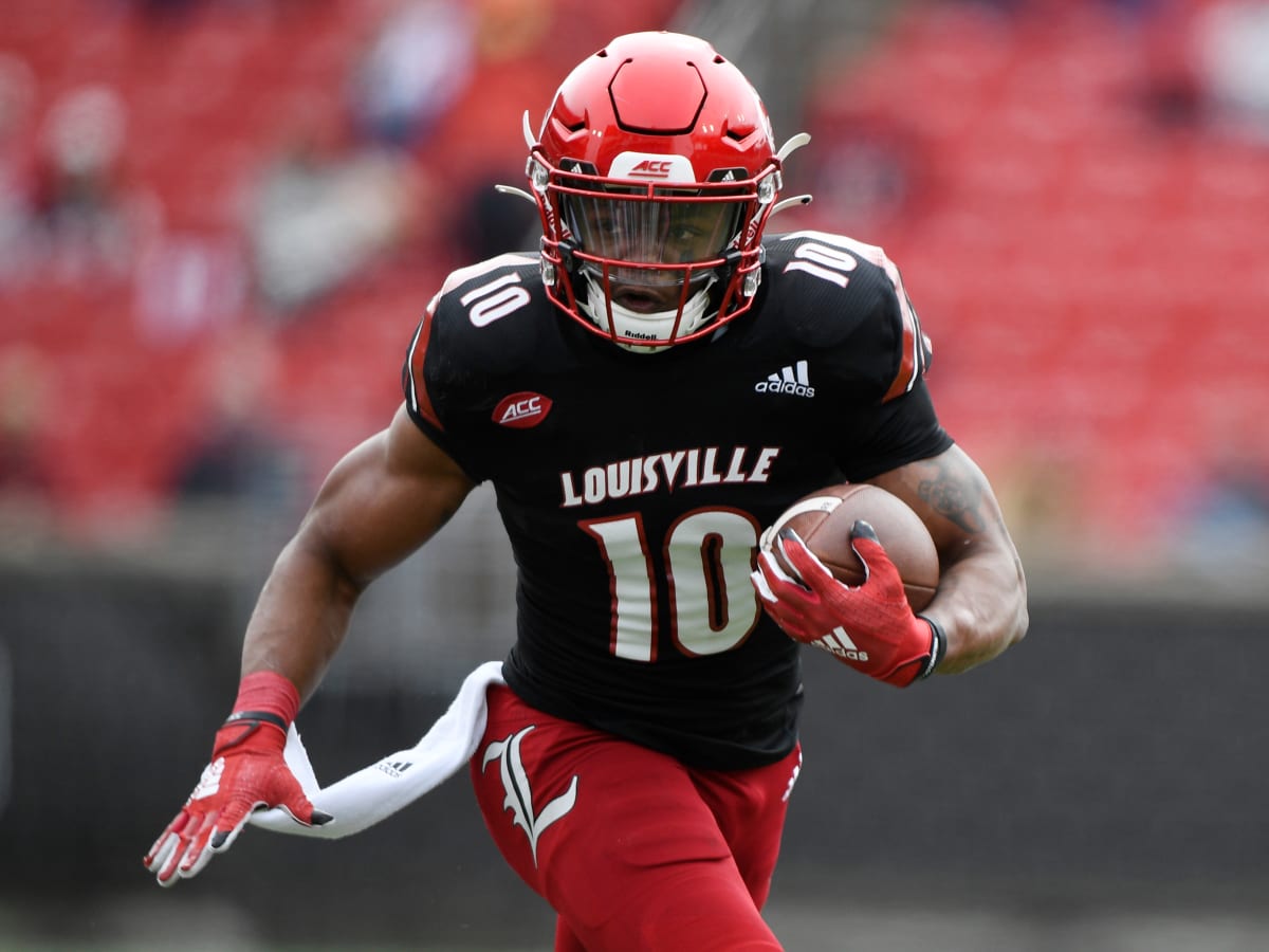 Louisville running back Javian Hawkins (10) runs from the pursuit