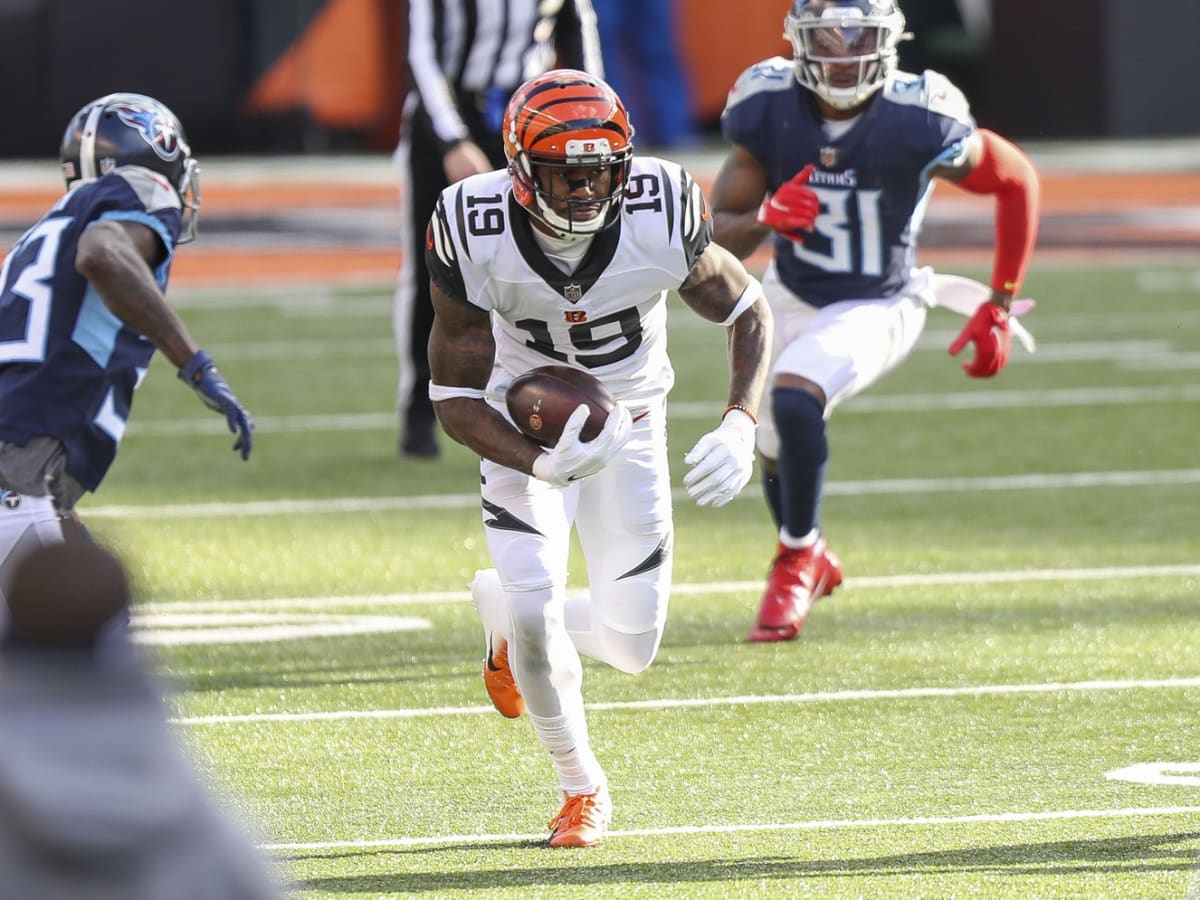 Cincinnati Bengals wide receiver Auden Tate (19) runs downfield