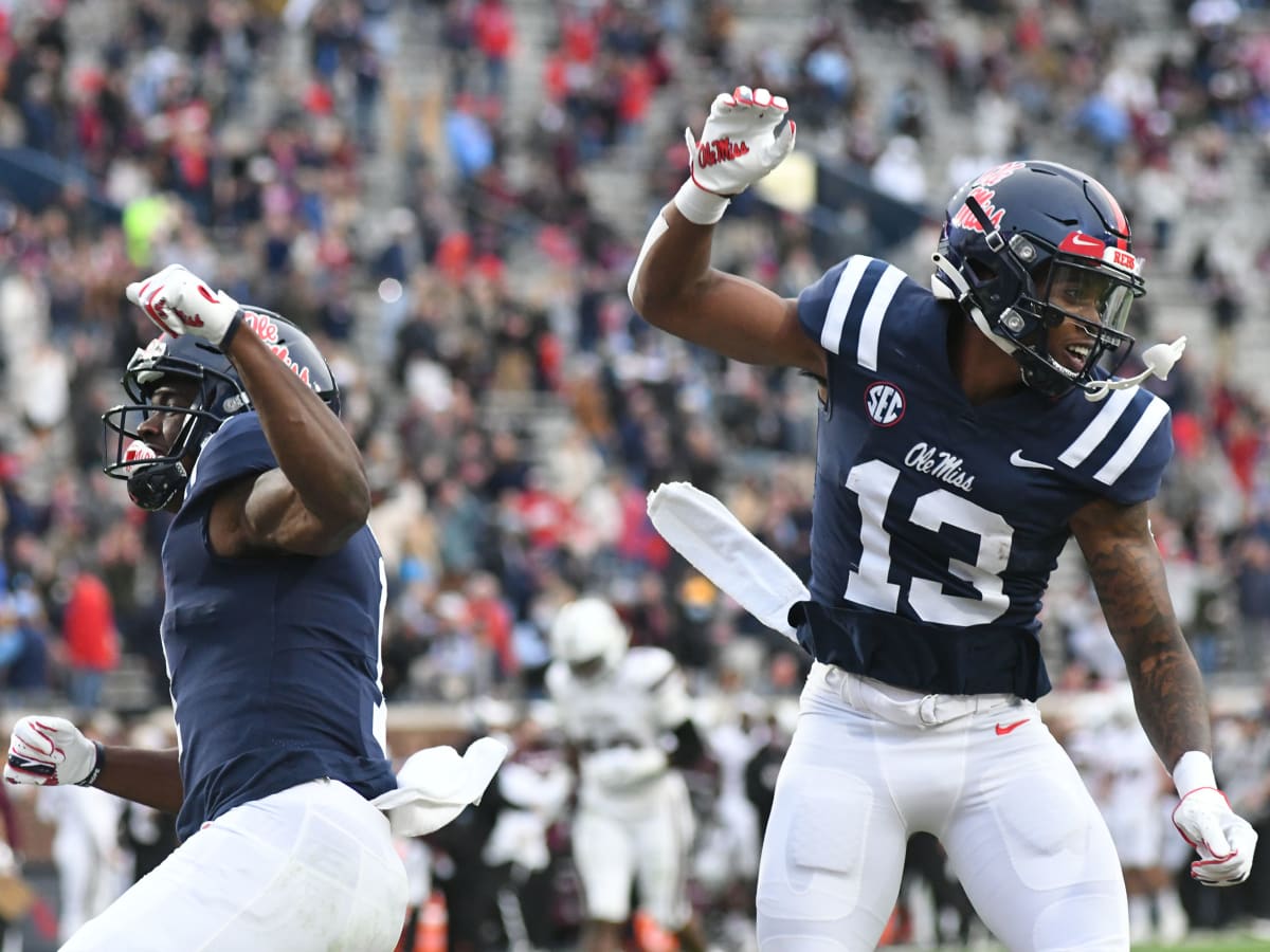 Ole Miss QB Matt Corral barrels over official on touchdown run