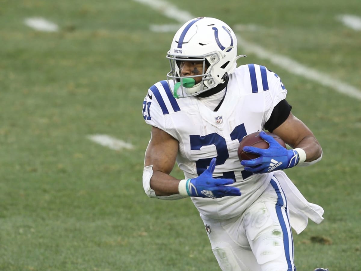 INDIANAPOLIS, IN - DECEMBER 18: Indianapolis Colts Running Back Nyheim  Hines (21) warms up for the NFL football game between the New England  Patriots and the Indianapolis Colts on December 18, 2021