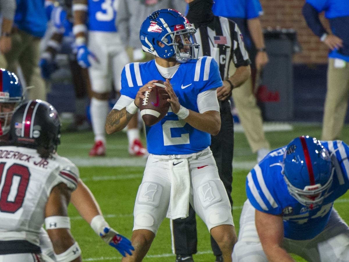 Ole Miss QB Matt Corral barrels over official on touchdown run