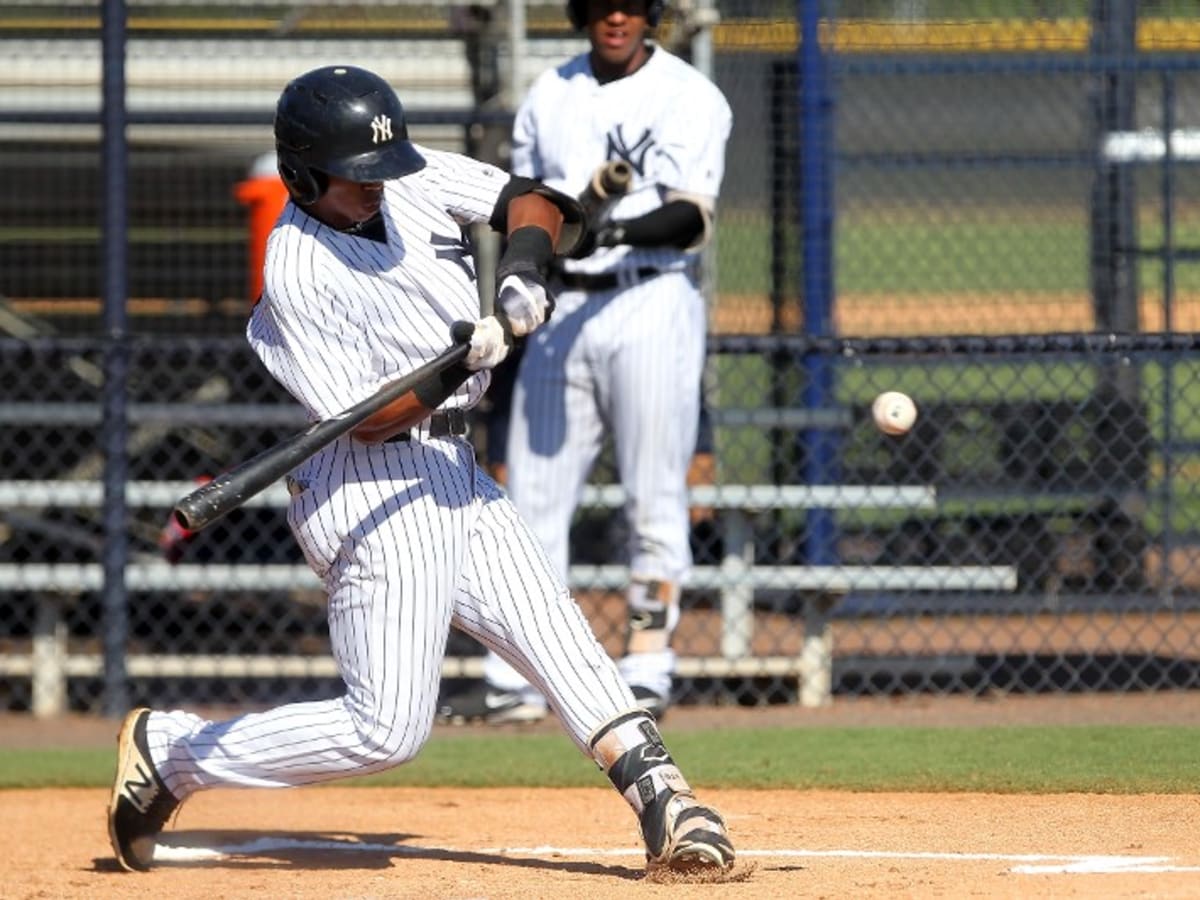 Aaron Boone relates with prospect Oswald Peraza