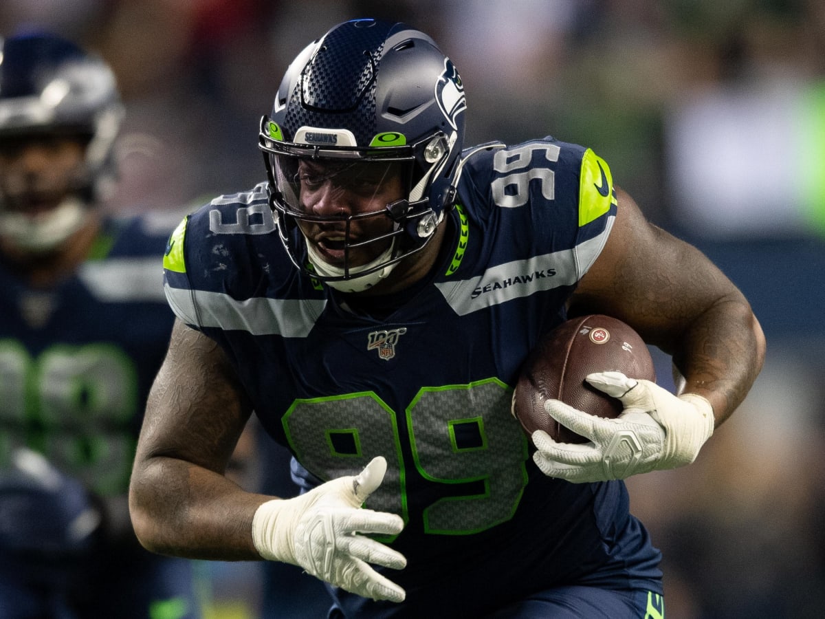 Seattle Seahawks defensive end Quinton Jefferson (99) reacts after