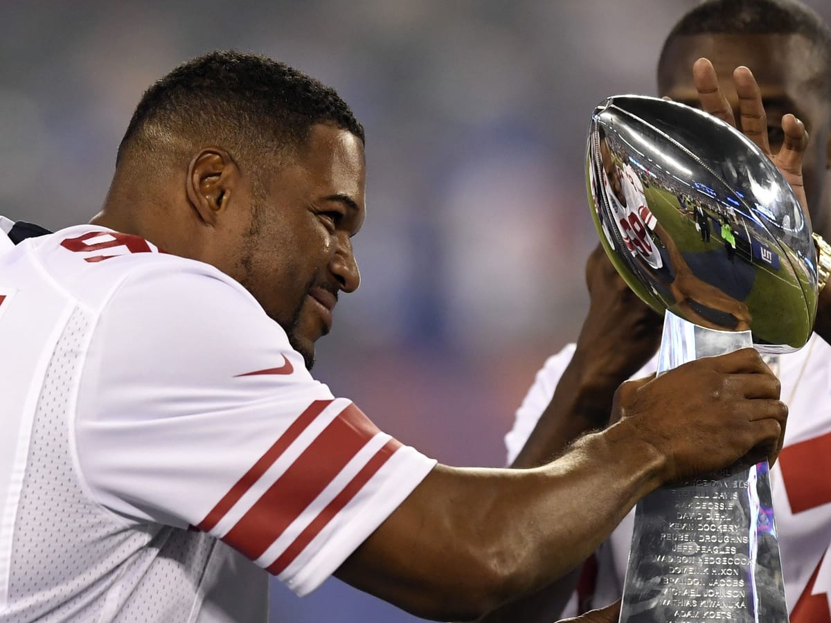 Michael Strahan Honored to Finally Have Jersey Number Retired By Giants -  Sports Illustrated New York Giants News, Analysis and More