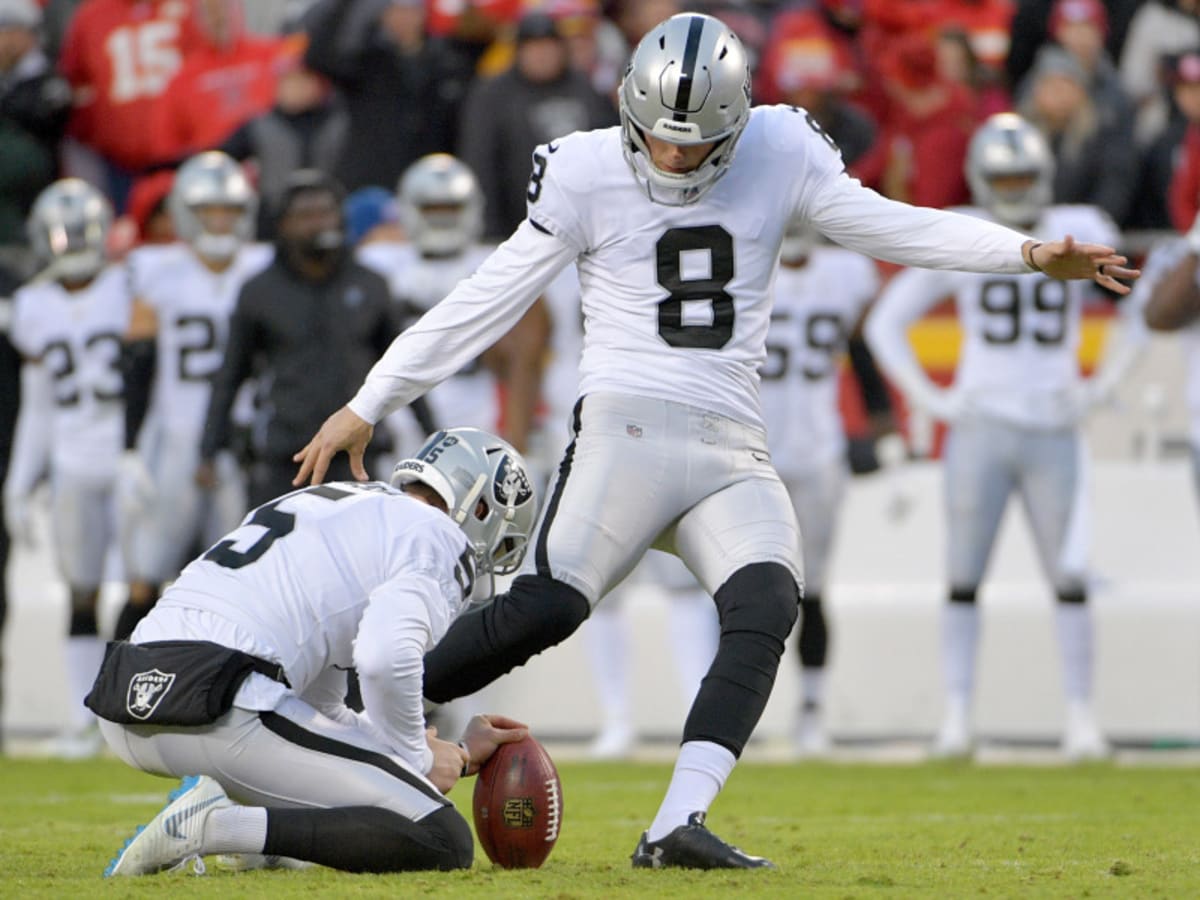 Las Vegas Raiders place kicker Daniel Carlson (2) after kicking field goal  during an NFL football game against the Seattle Seahawks, Sunday, Nov. 27,  2022, in Seattle, WA. The Raiders defeated the