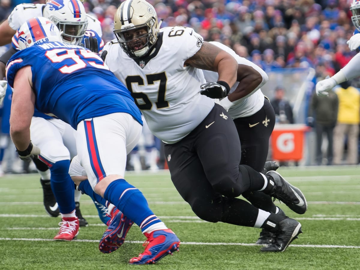 Tampa, Florida, USA. 09th Dec, 2018. New Orleans Saints offensive guard  Andrus Peat (75), New Orleans Saints center Max Unger (60) and New Orleans  Saints offensive guard Larry Warford (67) during the