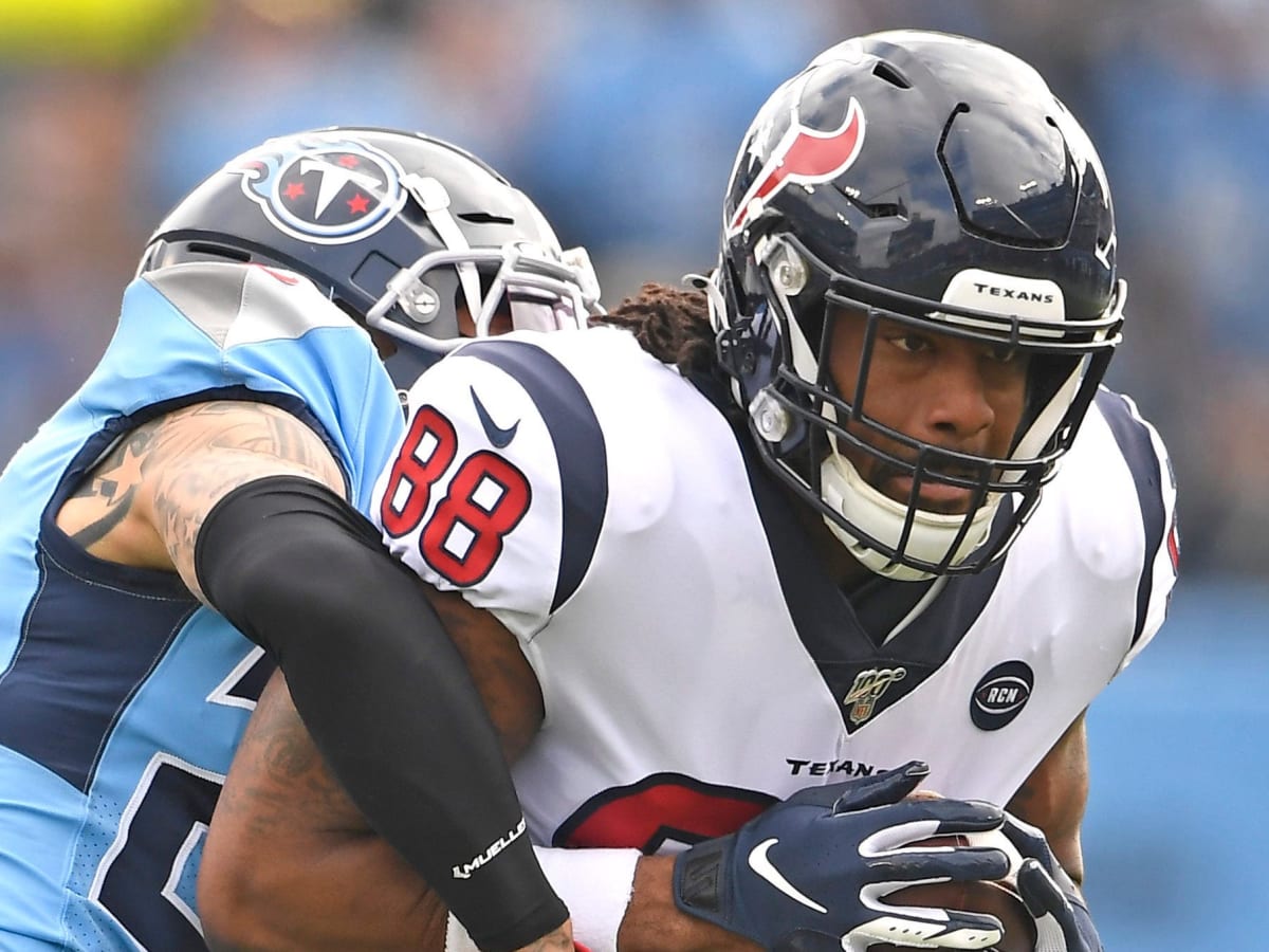 December 18, 2022: Houston Texans tight end Jordan Akins (88) fights off a  defender after making a catch during a game between the Kansas City Chiefs  and the Houston Texans in Houston