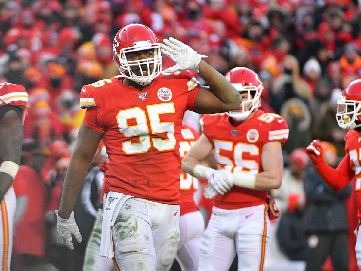 KANSAS CITY, MO - OCTOBER 16: Kansas City Chiefs defensive tackle Chris  Jones (95) raises his hands in the air asking for crowd noise in the fourth  quarter of an NFL game