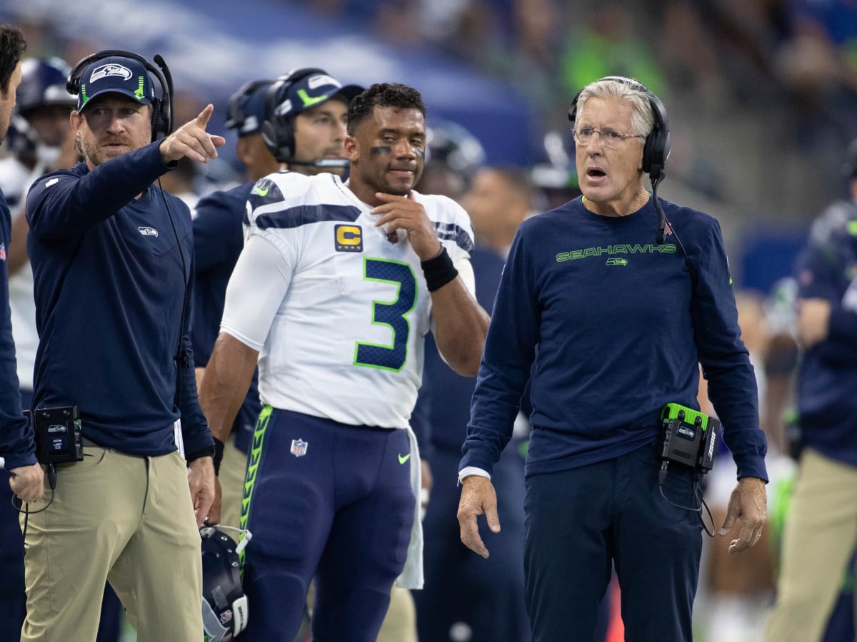 Seattle Seahawks quarterback Alex McGough (5) scrambles with the