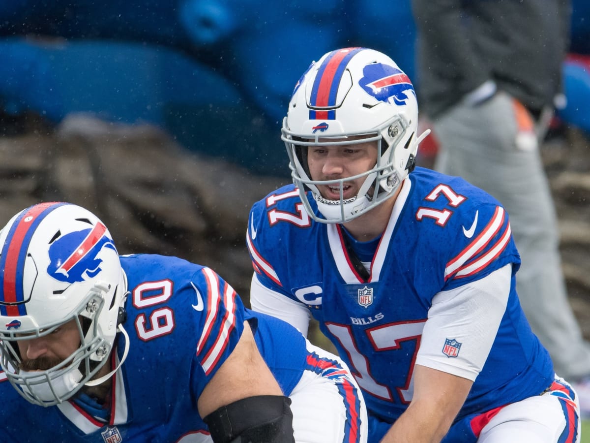 Buffalo Bills quarterback Josh Allen looks to throw against the New England  Patriots during an NFL football game at Gillette Stadium, Thursday, Dec. 1,  2022 in Foxborough, Mass. (Winslow Townson/AP Images for