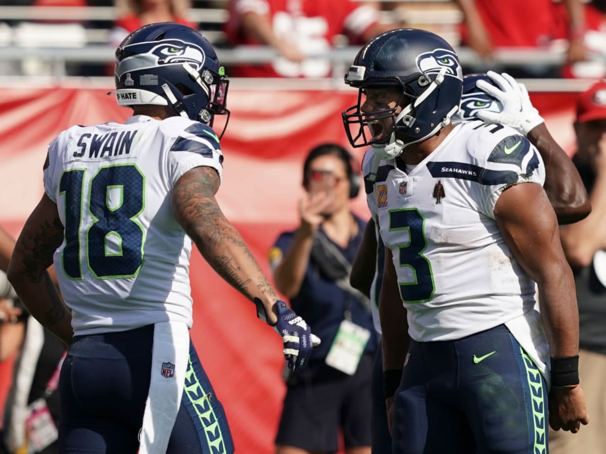 Wilson's 3 TDs lead Seahawks past 49ers 28-21