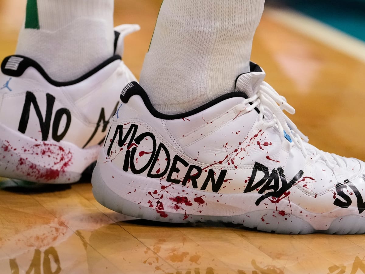 Enes Kanter says Nike is 'scared to speak up' against China and wears  'Modern Day Slavery' shoes in protest of Uyghur treatment
