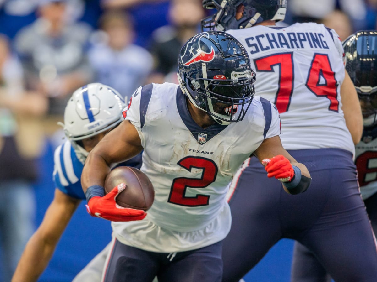 Dameon Pierce Houston Texans Unsigned Breaking a Tackle Photograph