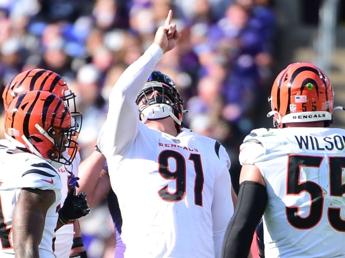 Cincinnati Bengals defensive end Trey Hendrickson (91) reacts after forcing  a fumble in the end zone against the Baltimore Ravens in the first half of  an NFL football game in Cincinnati, Sunday