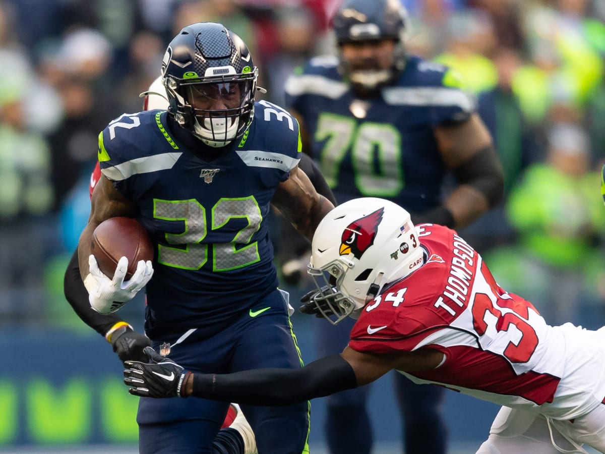 Seahawks RB Chris Carson doesn't practice Wednesday while team continues to  evaluate neck injury