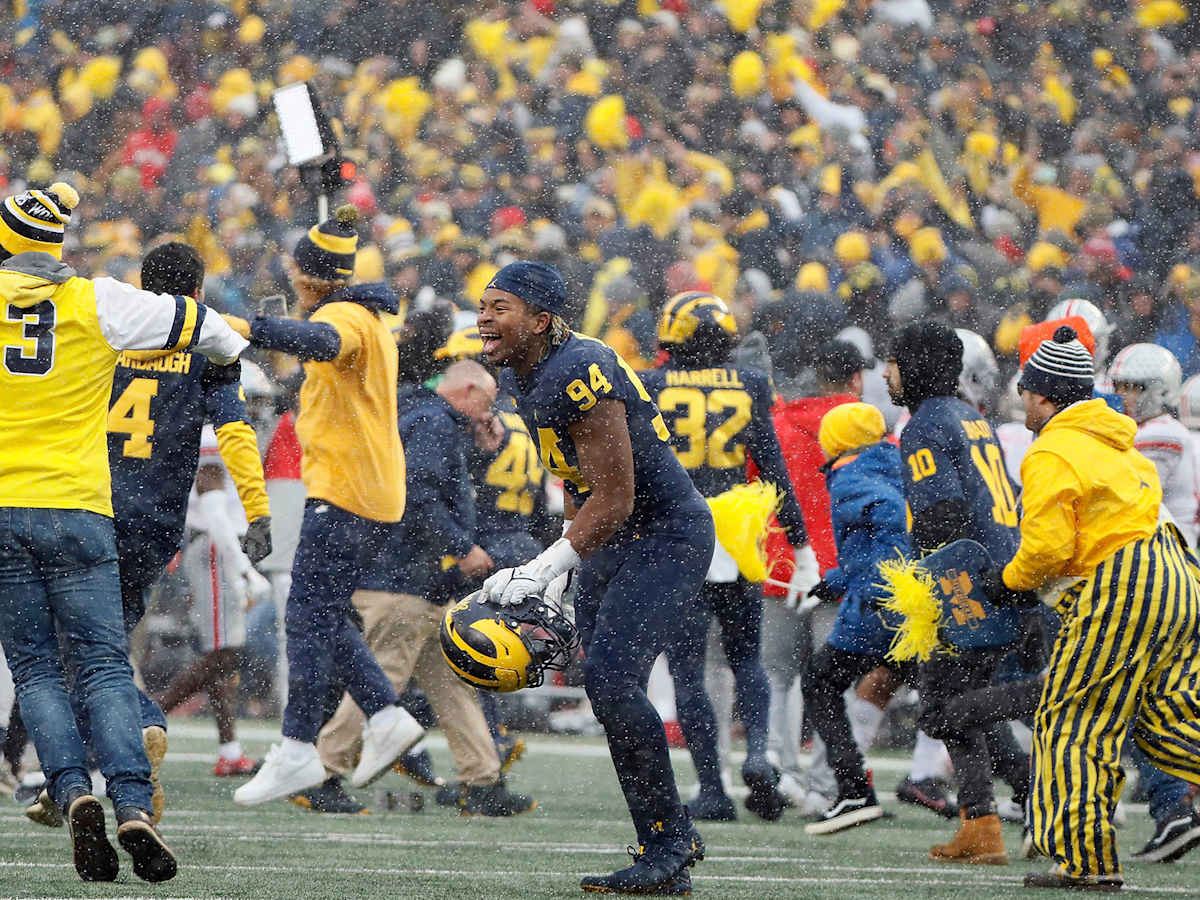 Finally! Michigan is on top of the world after beating Ohio State