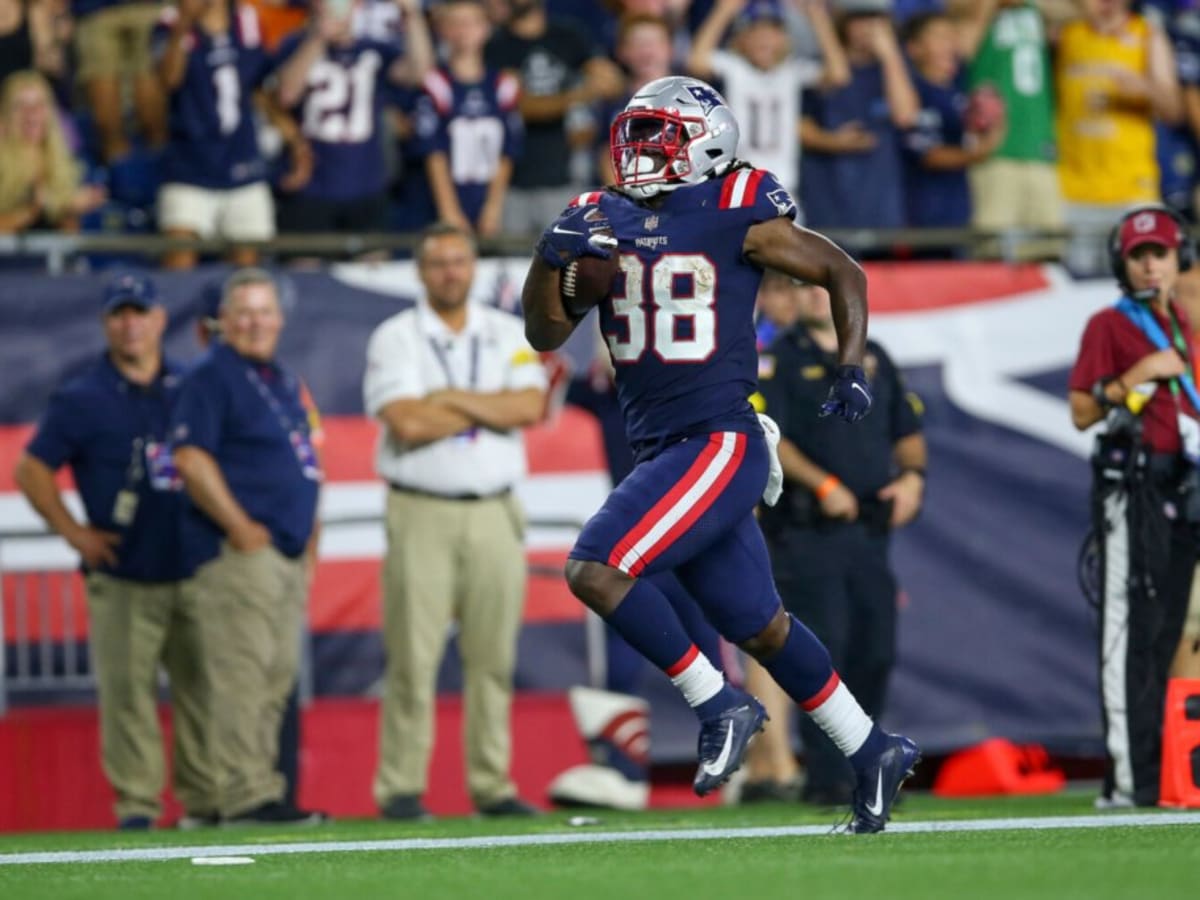 New England Patriots running back Rhamondre Stevenson throws Atlanta  Falcons defensive back to ground with furious stiff arm