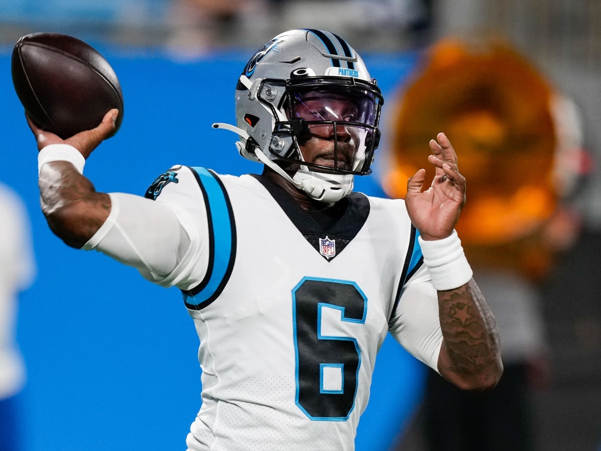 Carolina Panthers quarterback P.J. Walker (6) runs off the field