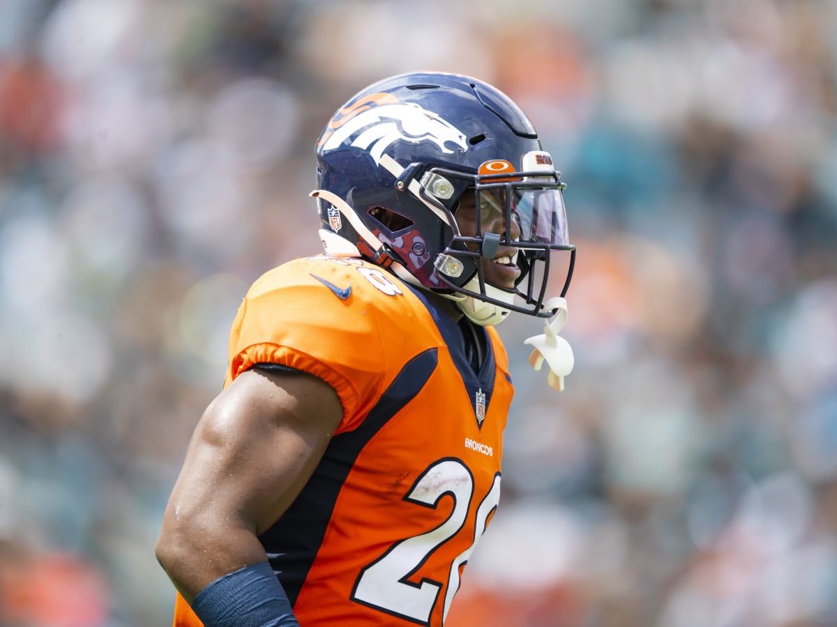 Denver Broncos running back Damarea Crockett (39) is tackled against the  Los Angeles Rams during the