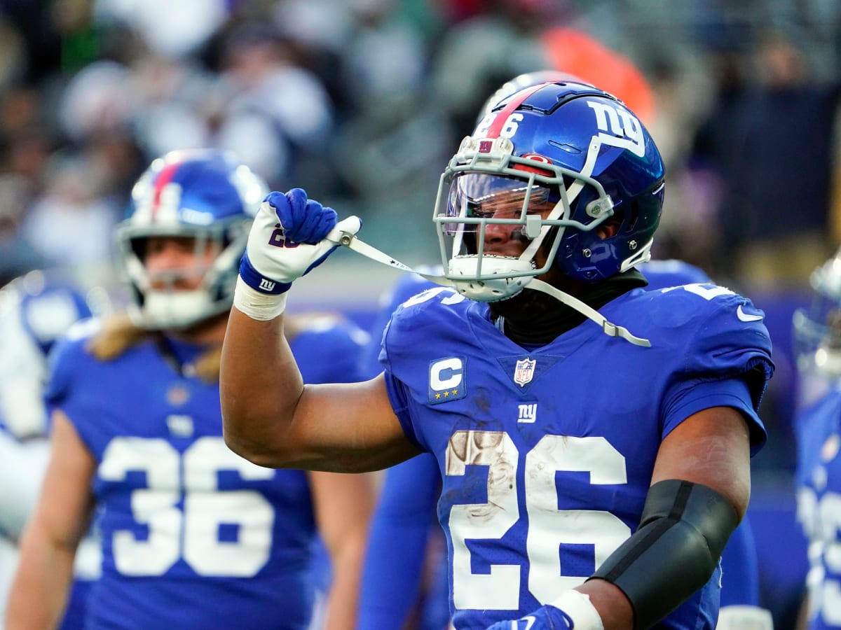 FILE - New York Giants running back Saquon Barkley (26) participates in  training camp at the NFL football team's practice facility, Friday, July  29, 2022, in East Rutherford, N.J. With the New