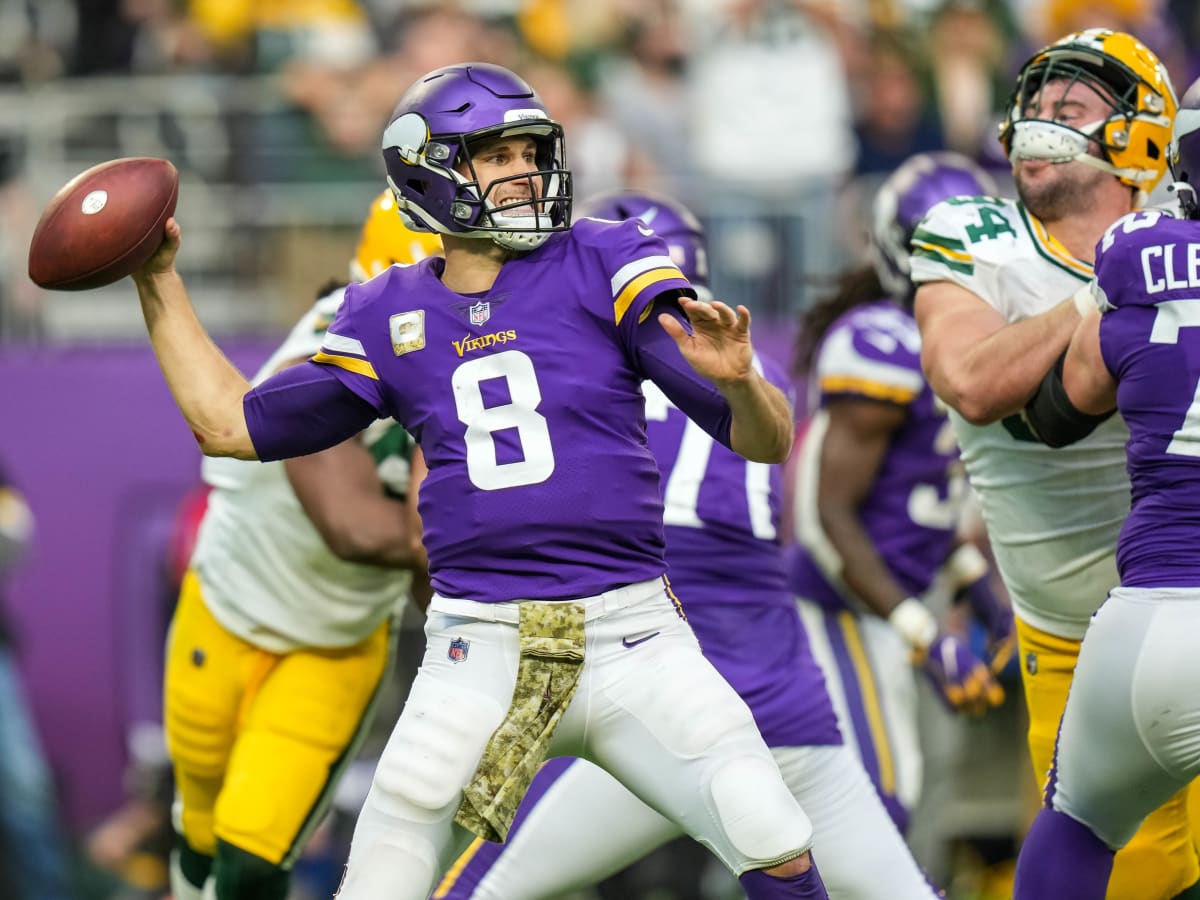 Green Bay, Wisconsin, USA. 02nd Jan, 2022. Minnesota Vikings quarterback  Sean Mannion #14 throws a pass during NFL football game between the Minnesota  Vikings and the Green Bay Packers at Lambeau Field