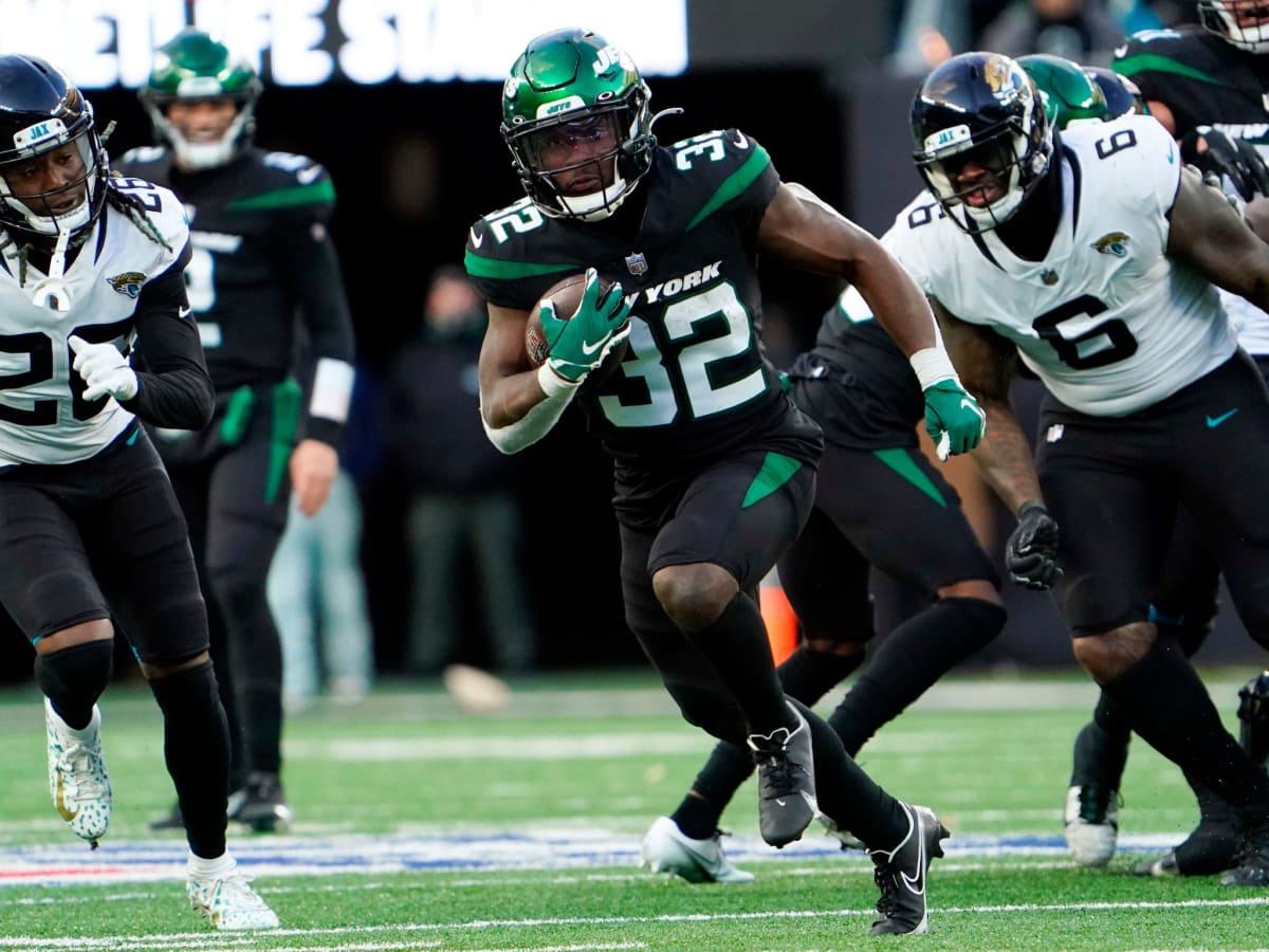 DENVER, CO - OCTOBER 23: New York Jets running back Michael Carter walks on  the sidelines before a NFL game between the New York Jets and the Denver  Broncos on October 23