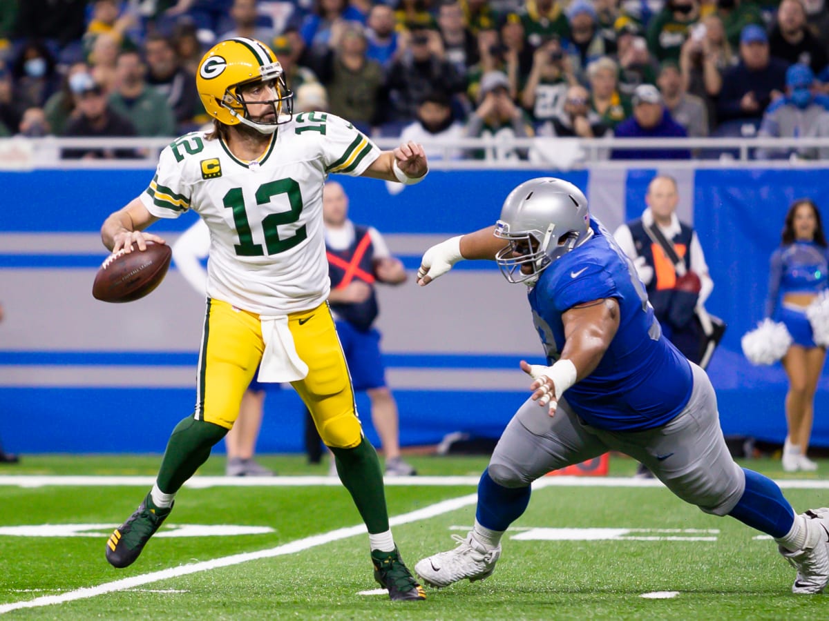 Green Bay Packers quarterback Aaron Rodgers (12) reaches over the goal line  for a touchdown during an NFL football game against the Los Angeles Chargers,  Sunday, November 3, 2019 in Carson, Calif.