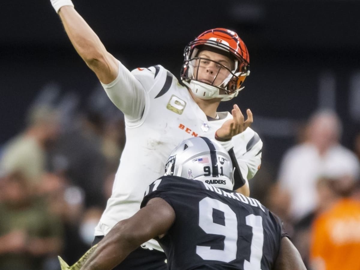 Bengals hold on to beat Raiders for 1st playoff win since 1991