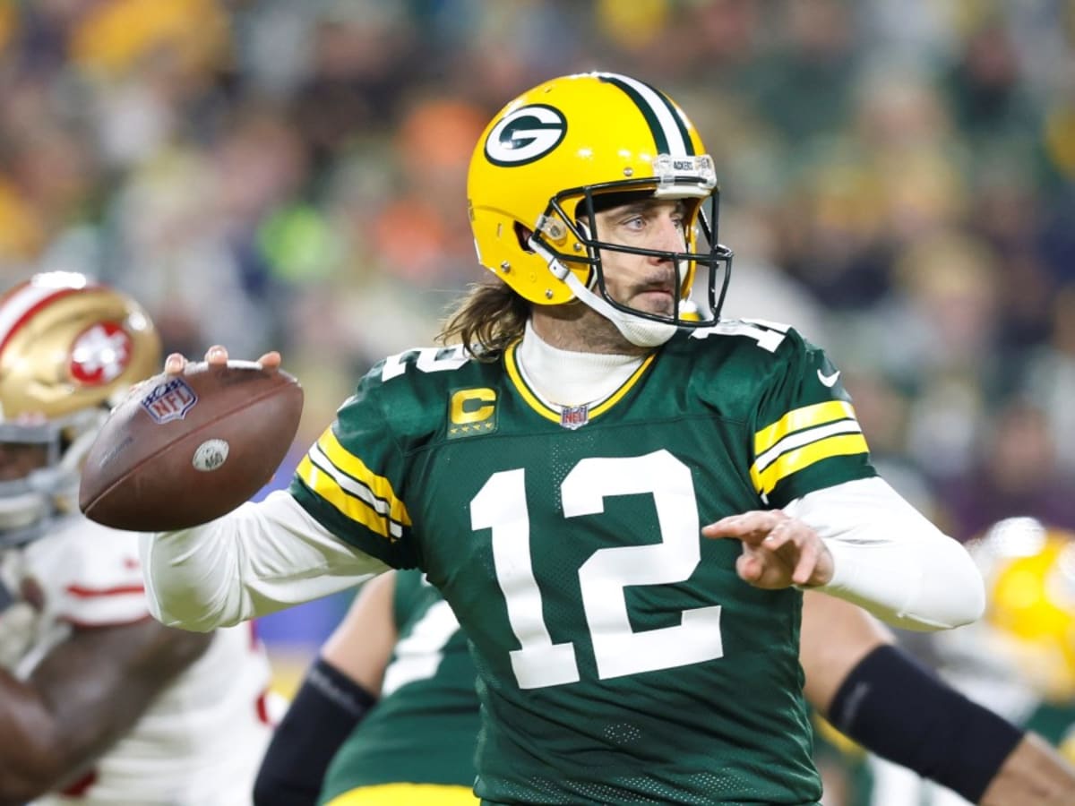 Aaron Rodgers, Packers manage more magic, control playoff fate into finale  - The Boston Globe