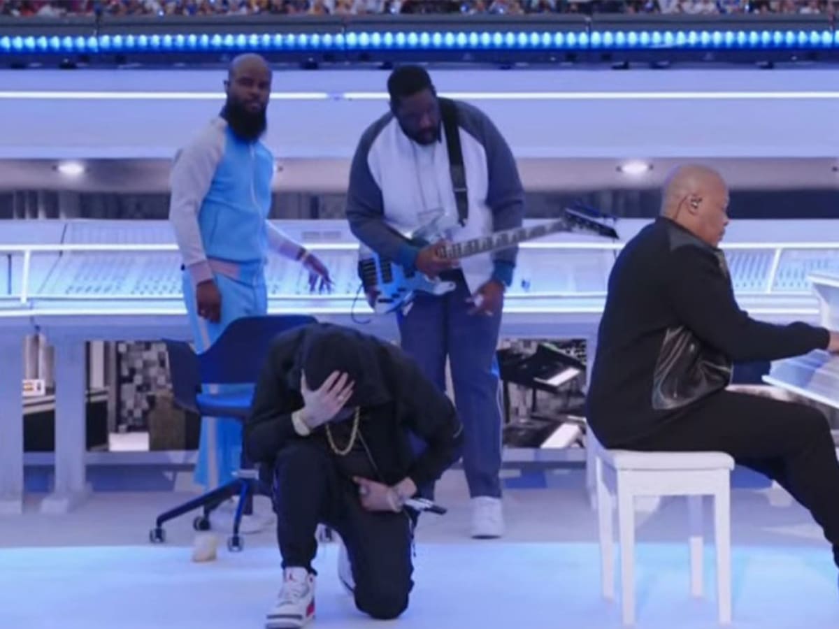 Eminem takes a knee during Super Bowl halftime performance
