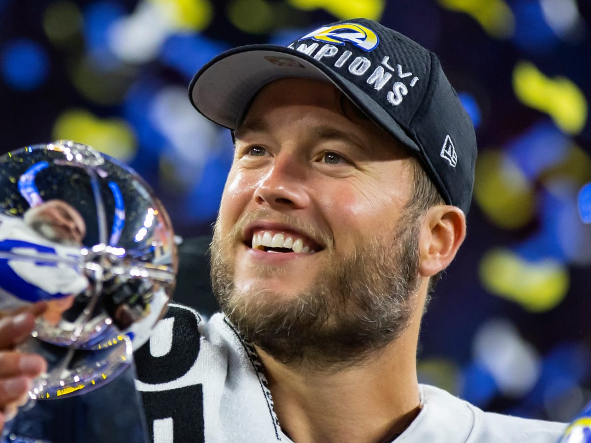 Matthew Stafford drinks bottle of 1942 tequila at Rams parade - Sports  Illustrated