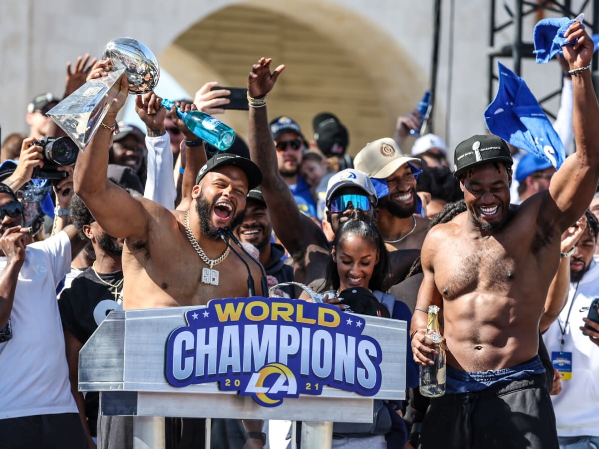 Super Bowl: Rams, QB will pay bills for photographer who fell off stage  during parade, Trending