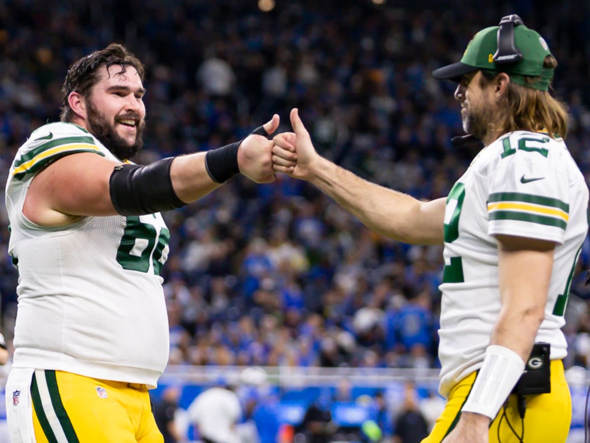 Green Bay Packers center Lucas Patrick (62) passes the ball during