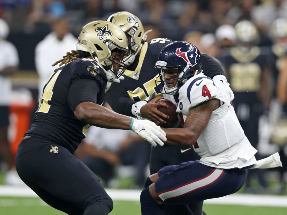 Houston Texans quarterback Deshaun Watson (4) passes in the first half of  an NFL football game against the New Orleans Saints in New Orleans, Monday,  Sept. 9, 2019. (AP Photo/Gerald Herbert Stock