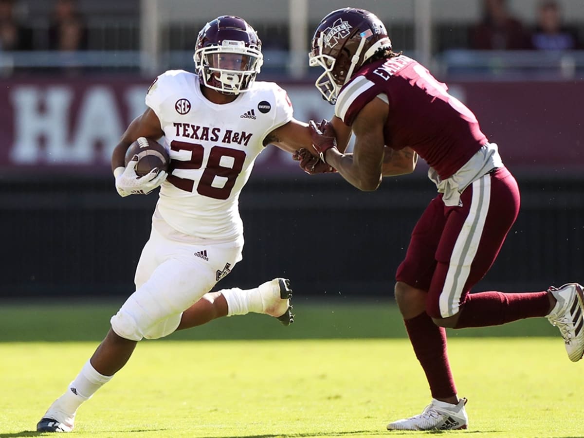 LOOK: Former Texas A&M Aggies Running Back Isaiah Spiller in Full Los  Angeles Chargers Gear - Sports Illustrated Texas A&M Aggies News, Analysis  and More