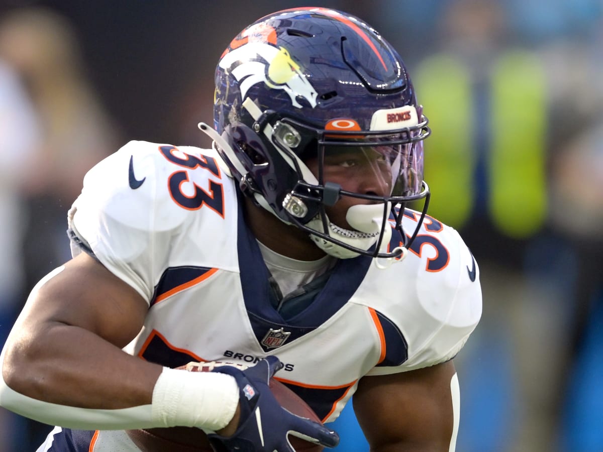 Denver Broncos running back Mike Boone (26) takes part in a drill at an NFL  organized