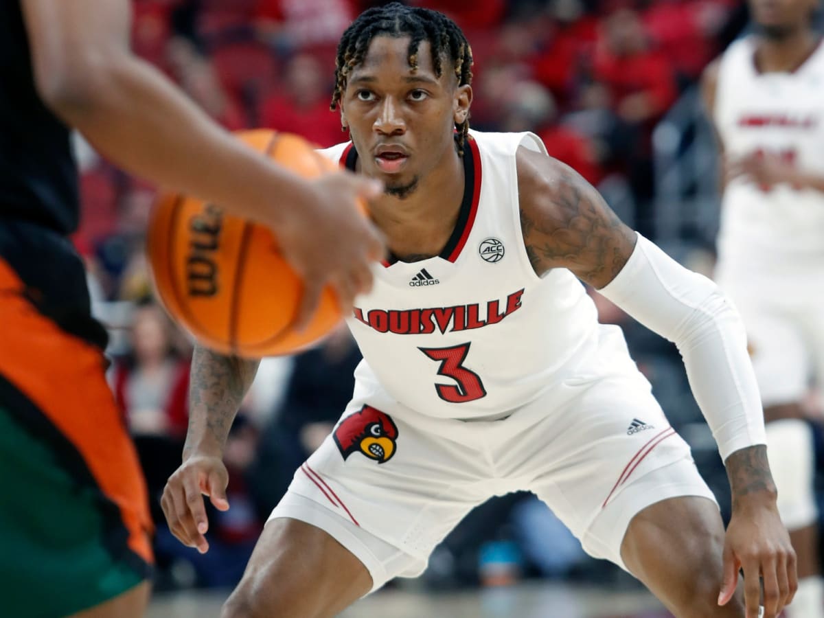 Mason Faulkner of the Louisville Cardinals brings the ball up court News  Photo - Getty Images