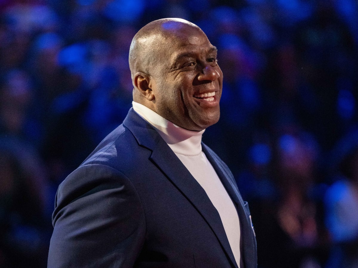 Magic Johnson joins Sixers owner Josh Harris' group in bid to buy