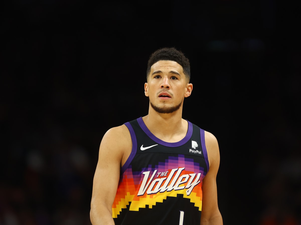 Suns Uniform Tracker on X: Devin Booker giving us a sneak peek at the new  Suns uniforms. Notice that the trim patterns match my latest predictions.  You can also see a little