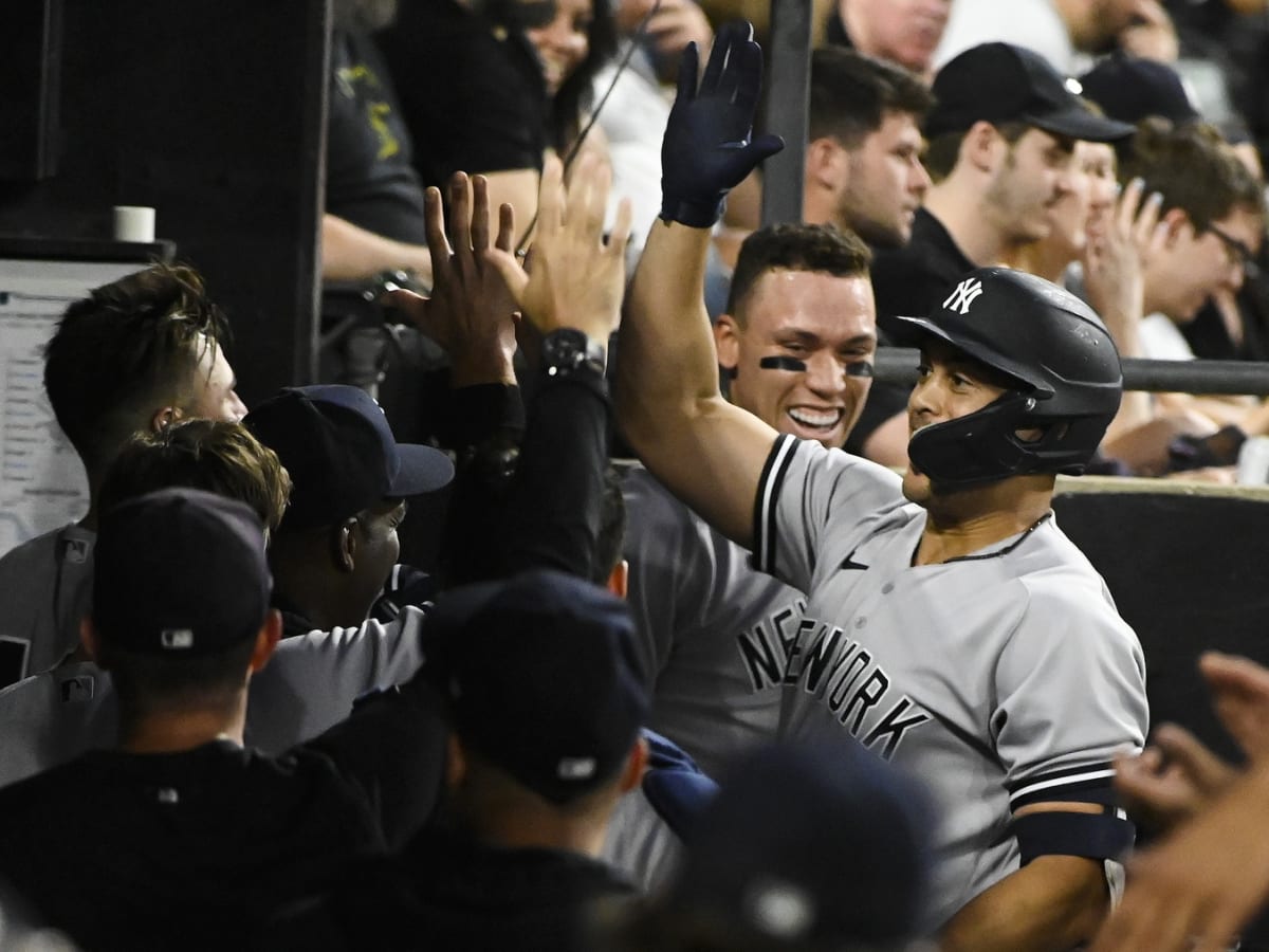 OAKLAND, CA - AUGUST 28: New York Yankees Outfielders Joey Gallo (13), Aaron  Judge (99), and Giancarlo Stanton (27) talks during the MLB game between  the New York Yankees and the Oakland